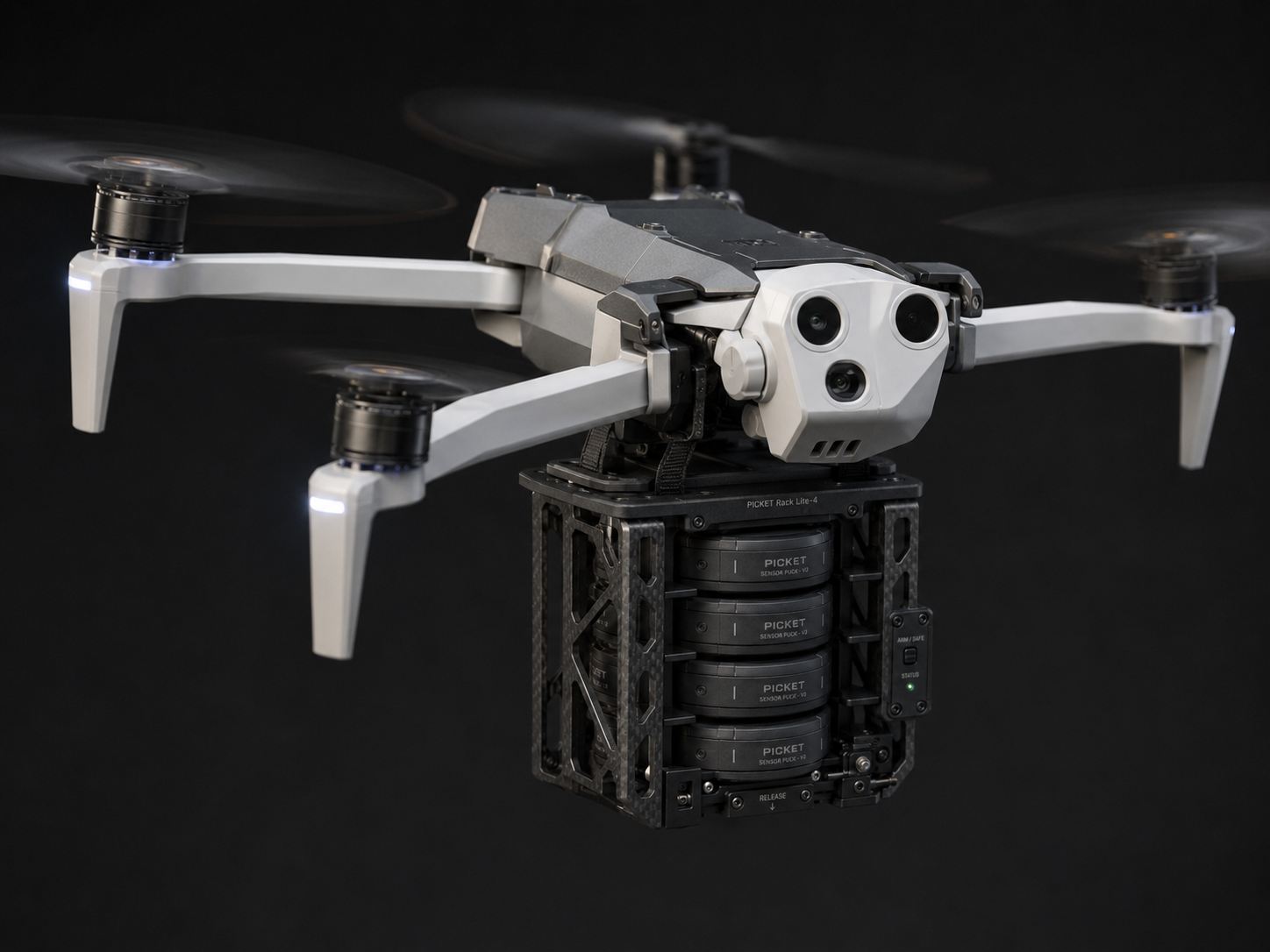 Quadcopter drone carrying a modular sensor payload rack